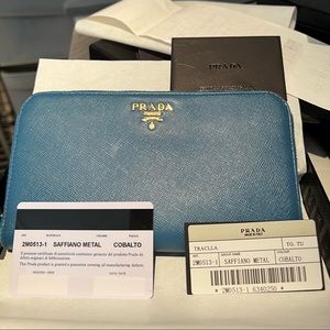 Prada cobalt blue long zip around saffiano leather wallet